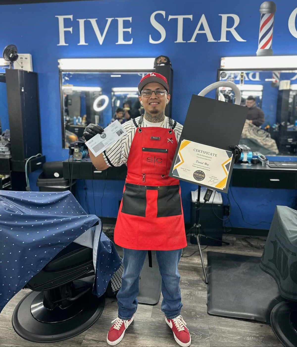 Barber Apprentice Holding Their New Barber License