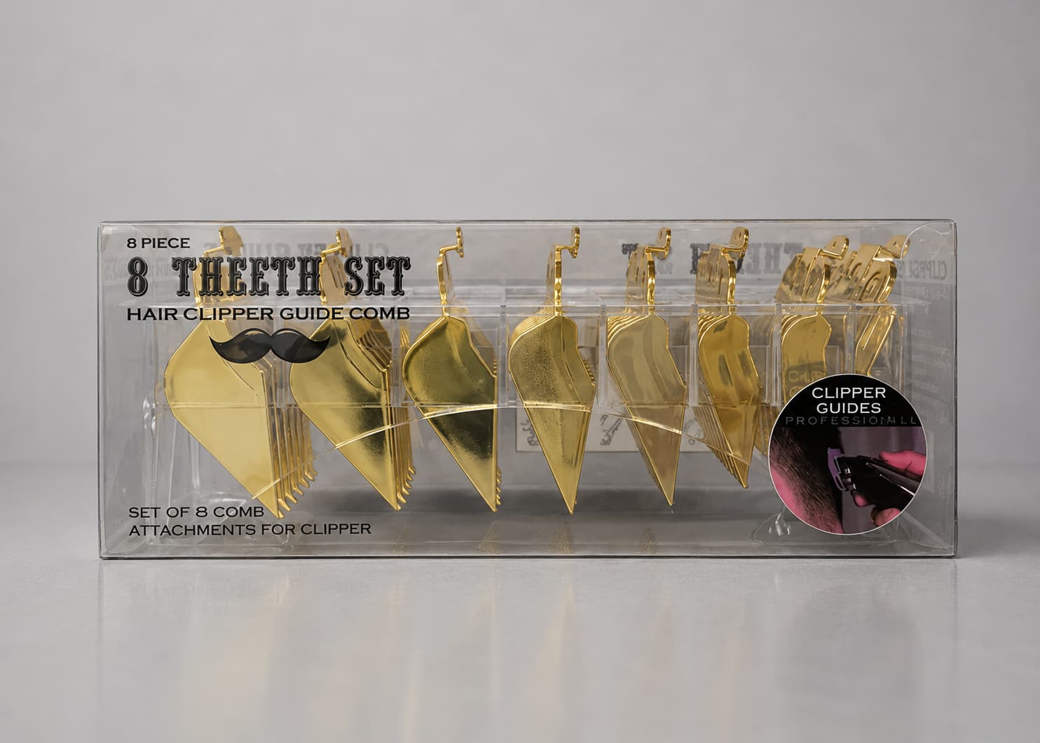 Set of 8 gold hair clipper guide combs in packaging on a gray background
