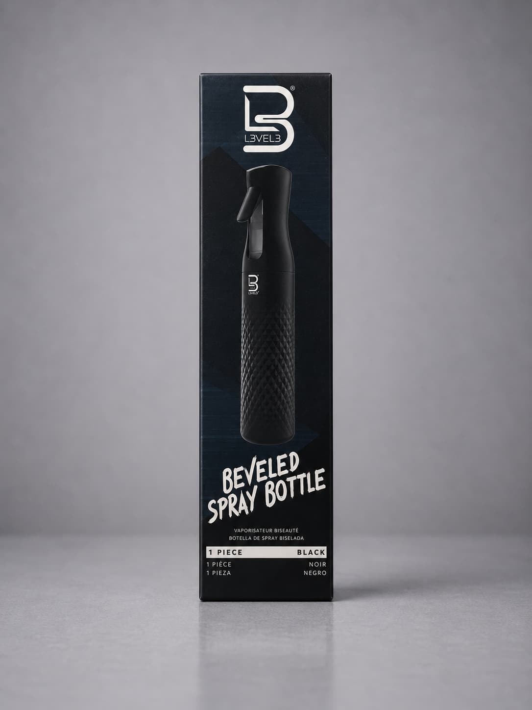 Black spray bottle packaging with brand logo on a gray background