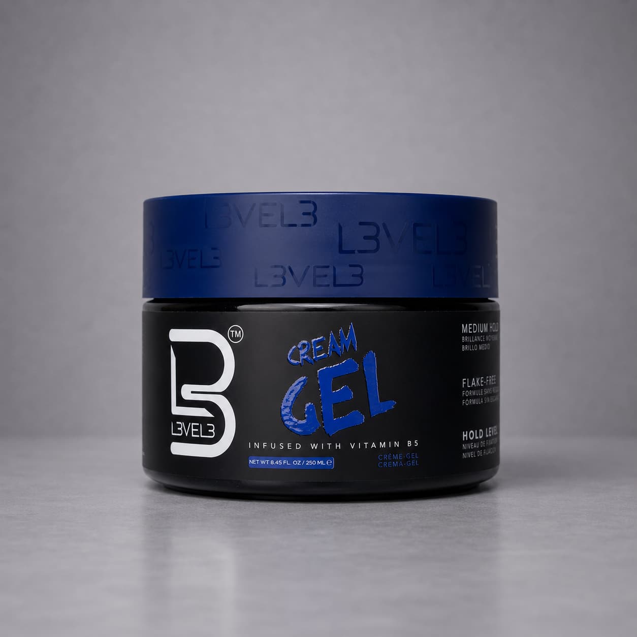 Jar of Level 3 Cream Gel on a gray background