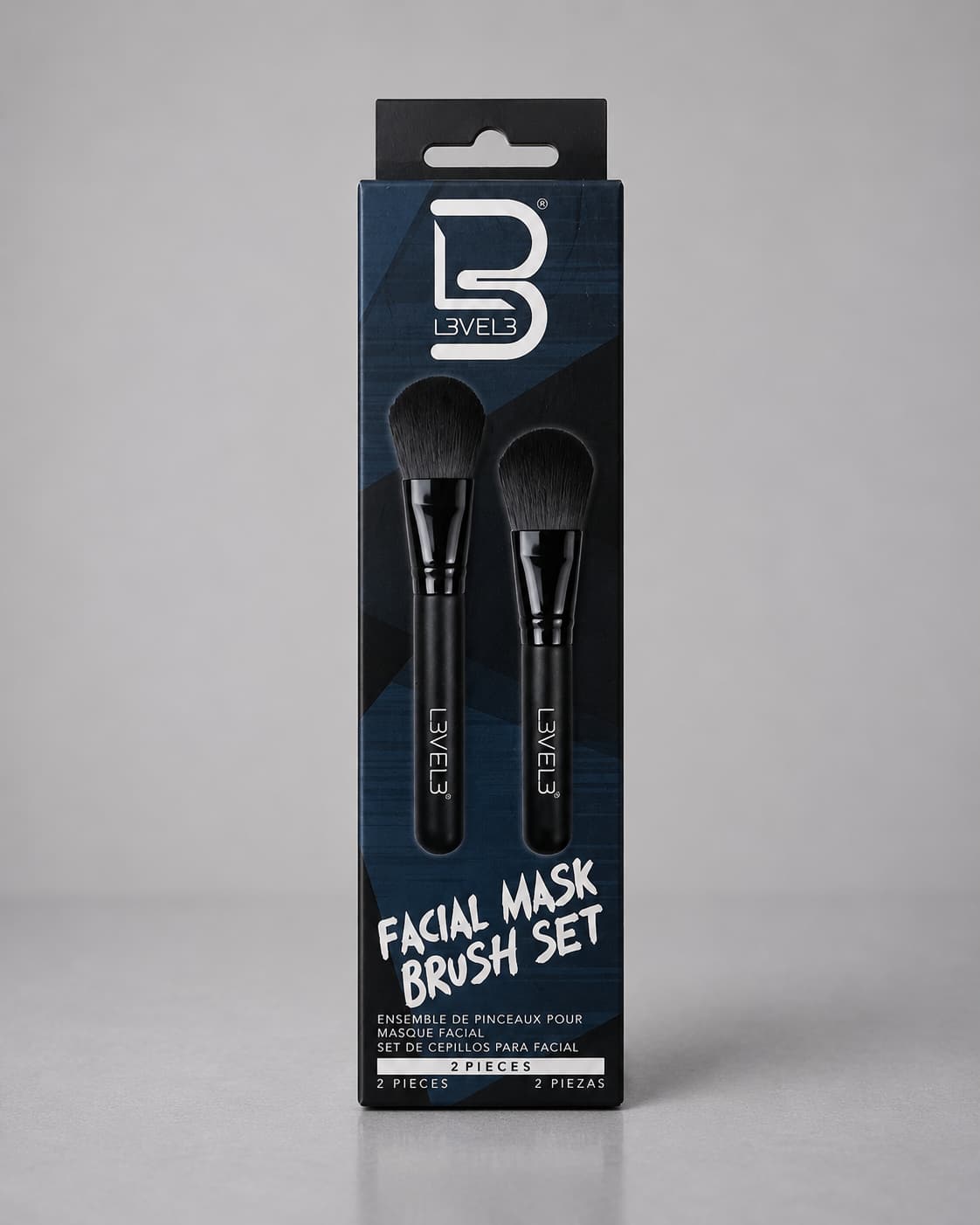 Level 3 facial mask brush set packaging on a gray background