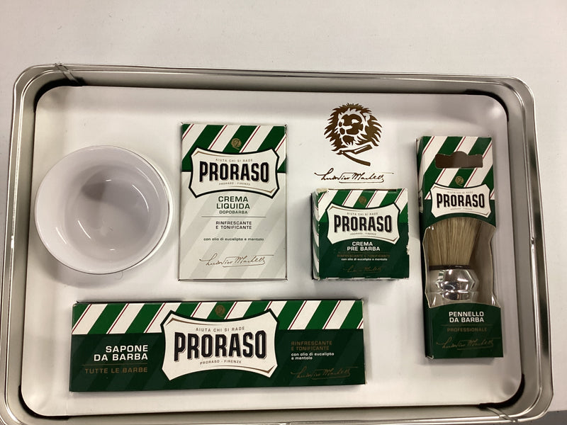 Proraso grooming kit with various products on a tray